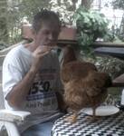 1 hen named Prissy eating pizza with my man Bobby