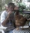 1 hen named Prissy eating pizza with my man Bobby